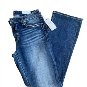 MISS ME  Boot Cut Midrise Jean. Winged Energy
